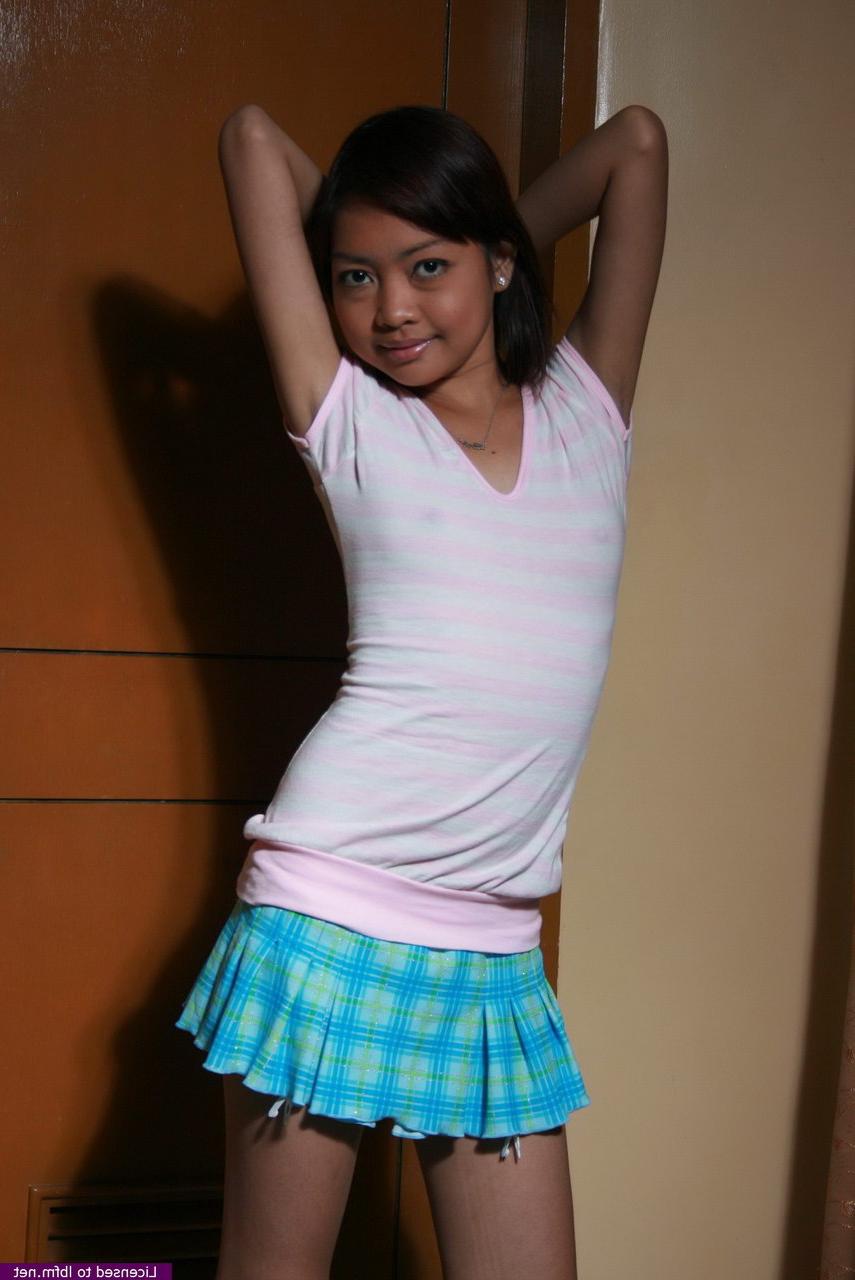 12P Petite Asian first timer revealing nearly flat chest and pussy for first time