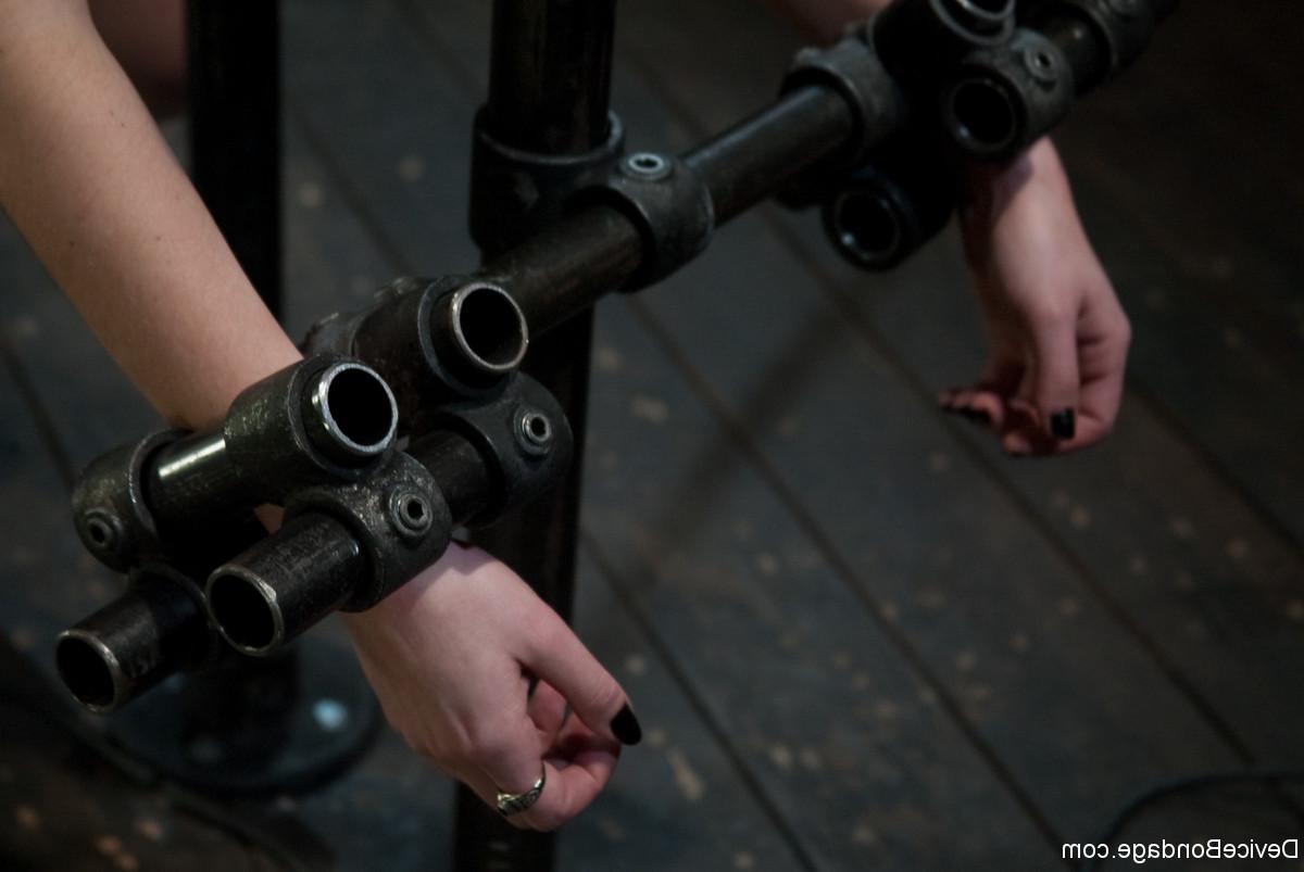 20P Maggie Mayhem gets whipped & toyed while tied to a custom metal bondage device