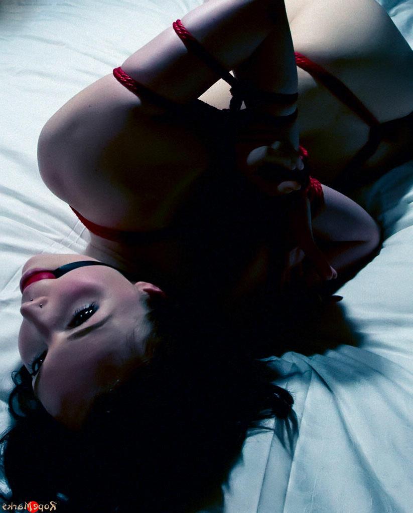 16P Dutch Dame finds herself hogtied on a bed in high-heeled footwear