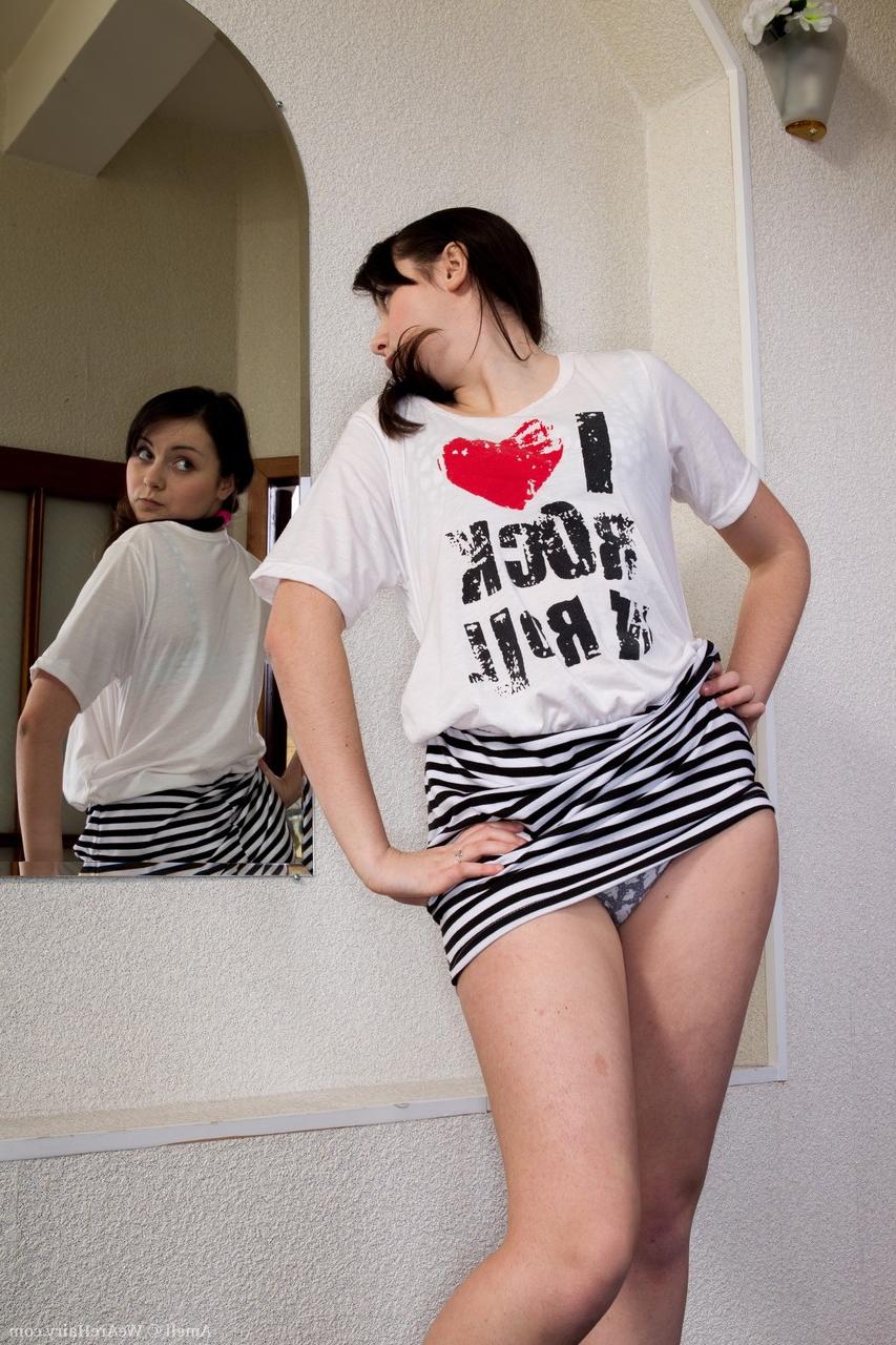 20P Gorgeous brunette Ameli showing her small breasts & her inviting hairy pussy