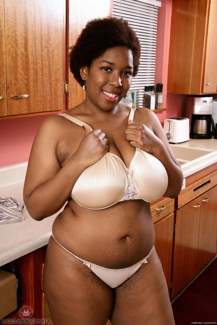 20P Ebony fatty Misty unleashes her big tits and spreads her furry cunt