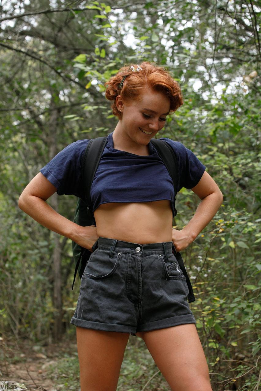 13P Ginger beauty with a big ass Dabney Conrad strips to her panties while hiking