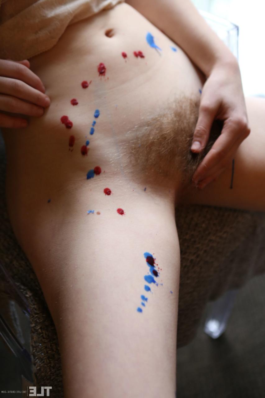 20P Teen with small tits Sondrine rubs her hairy twat after playing with wax