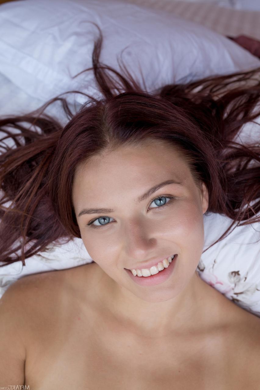 20P Cute redheaded babe Nana slowly displays her body and poses on her bed