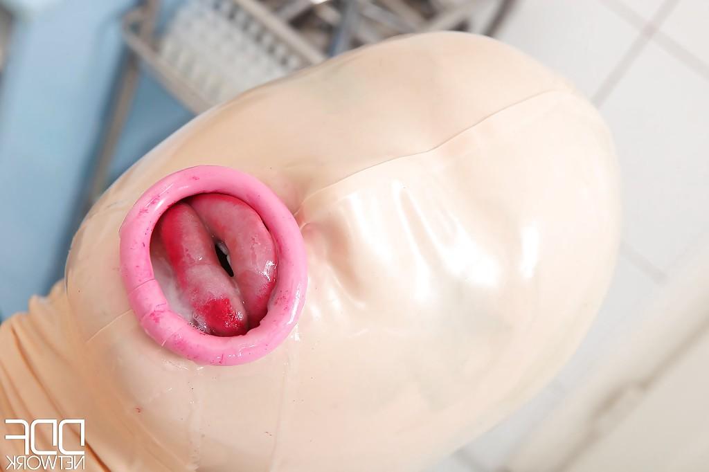 16P Latex freak Latex Lucy receiving mouthful of jizz in rope bondage from doctor
