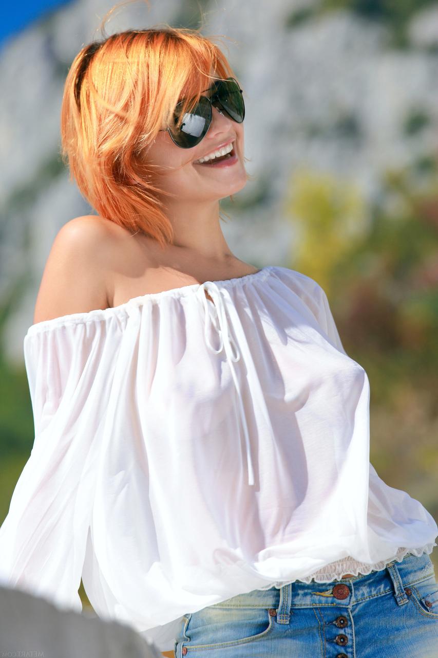 20P Beutiful redheaded babe Violla A shows off her yummy pussy all nude outdoors