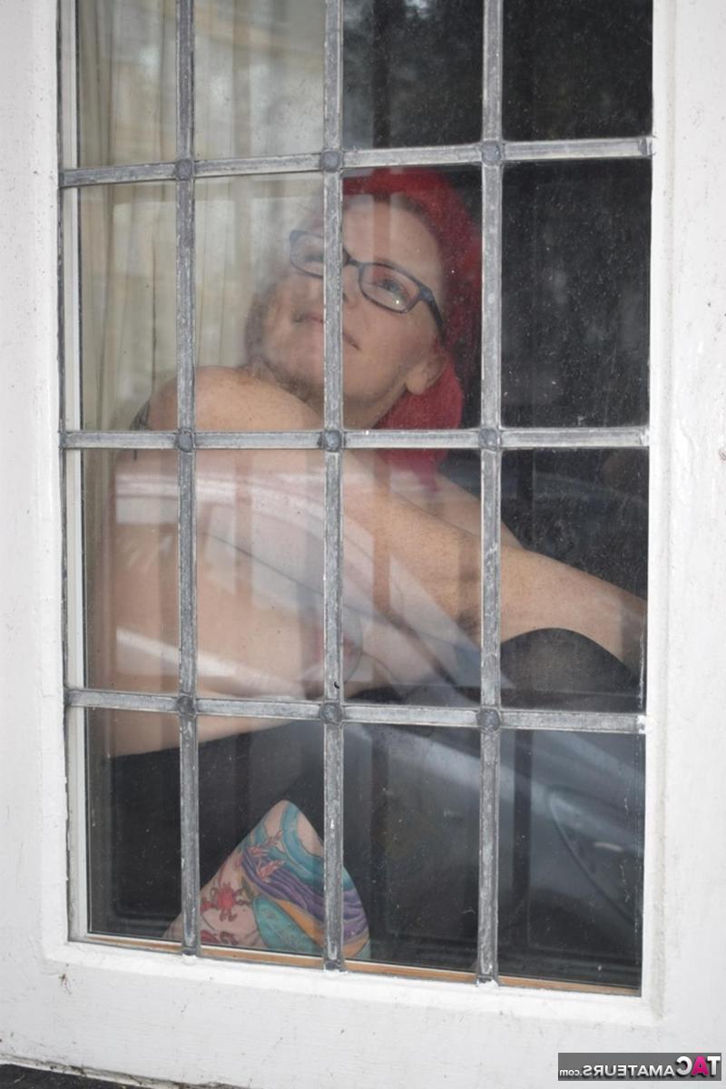16P Overweight redhead gets naked while wearing glasses and crotchless pantyhose