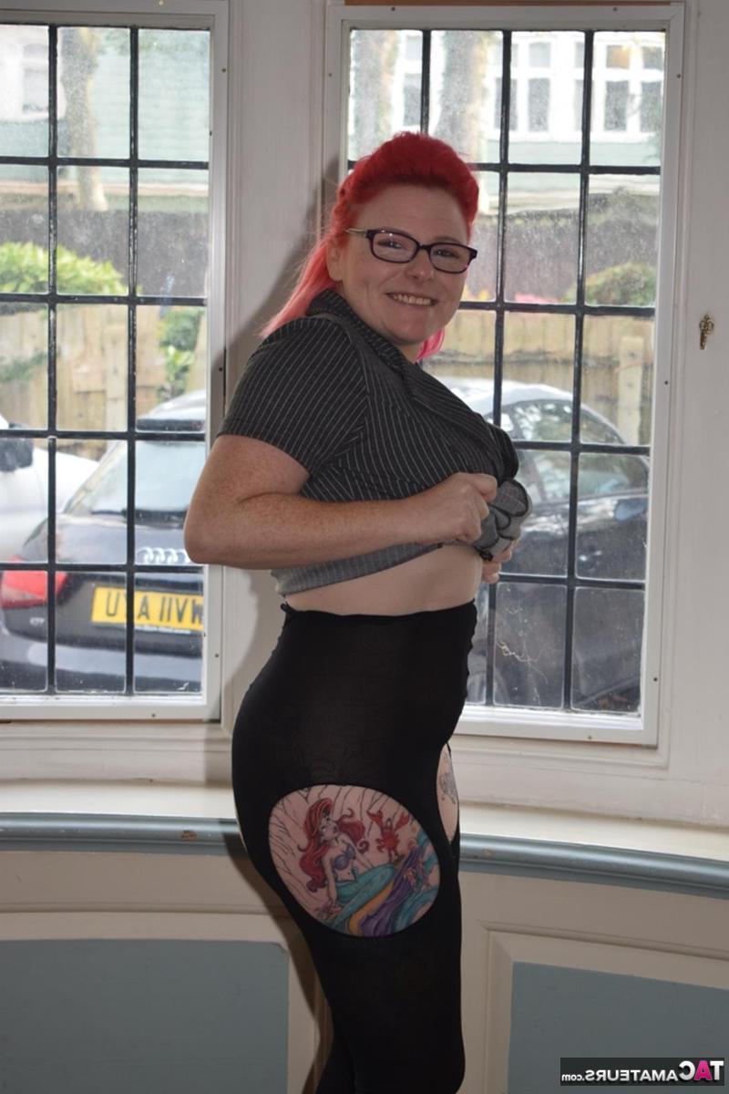 16P Overweight redhead gets naked while wearing glasses and crotchless pantyhose