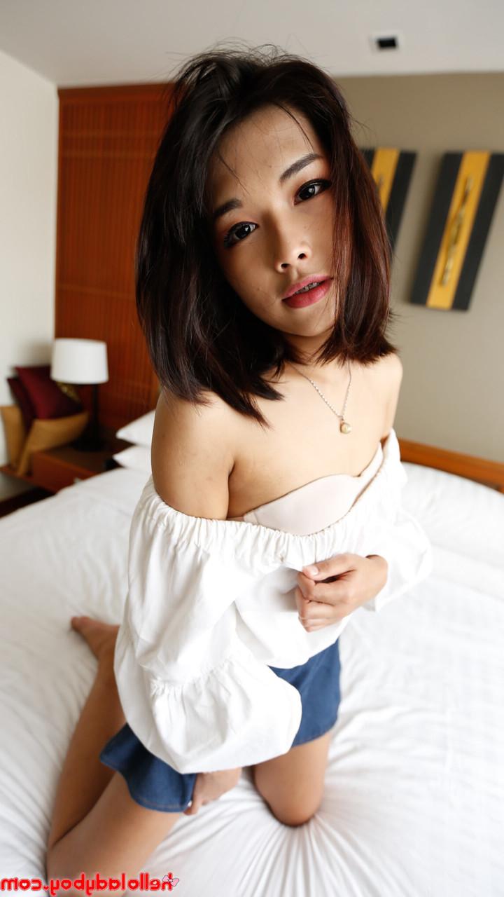 20P Gorgeous ladyboy Pream strips and poses in her sexy bra and panties