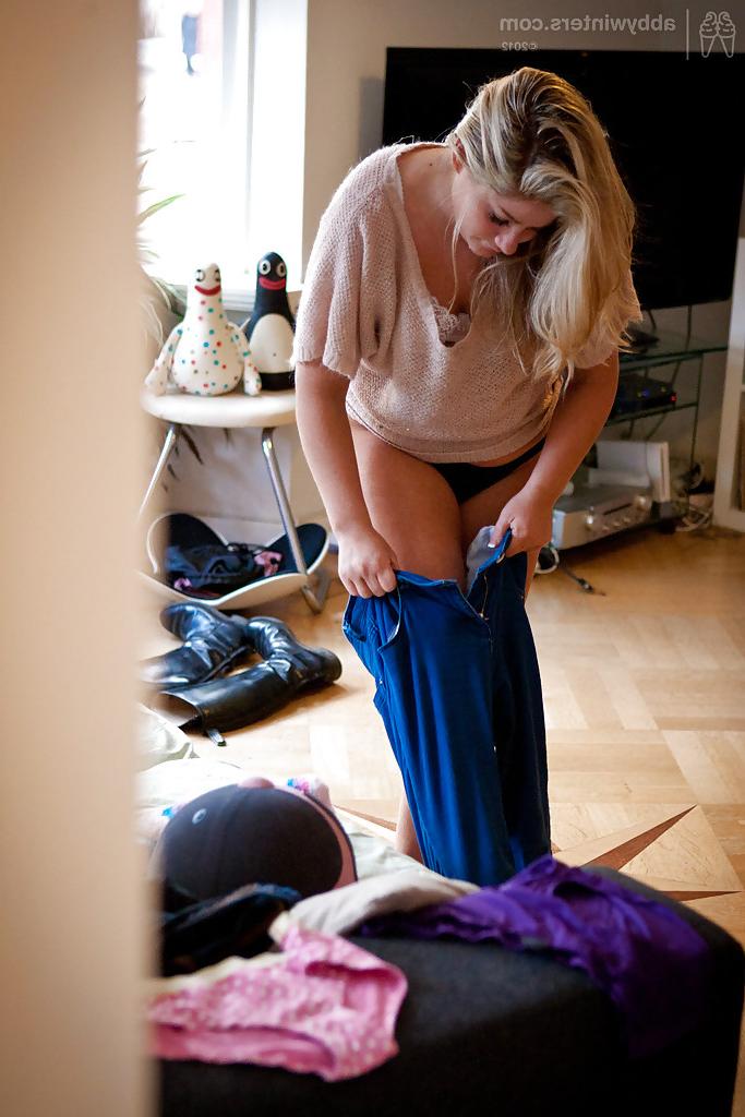 16P Chubby chick Leah K dressing her fat rolls after posing in the nude