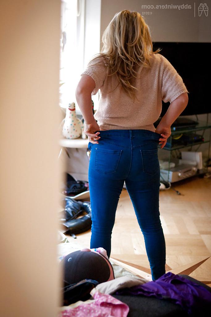 16P Chubby chick Leah K dressing her fat rolls after posing in the nude