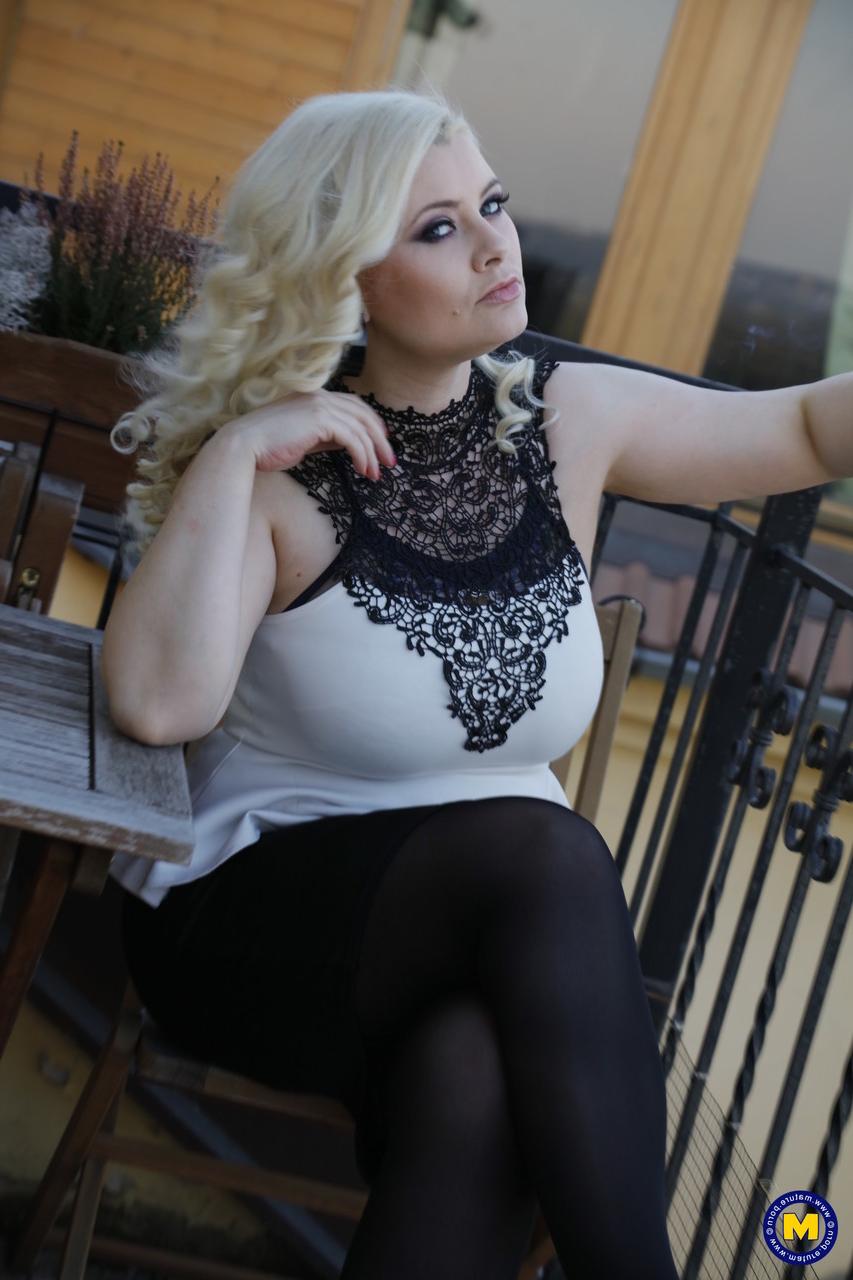 20P Blonde Czech MILF Alexa Bold teases with her big tits while smoking outdoors