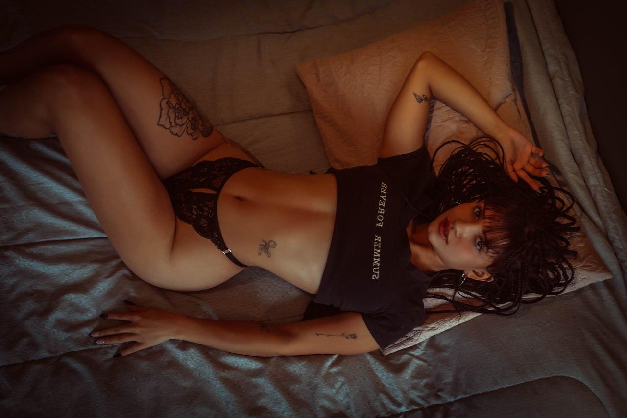 11P Pretty brunette Carly Light shows her big ass wearing sexy lingerie