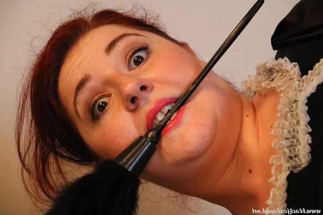16P Natural redhead is left tied up on a bed in her maid uniform