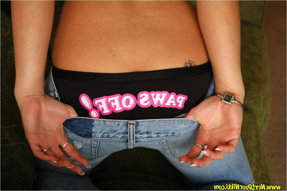 12P Redheaded amateur Nikki Sims teases in cute underwear upon a sofa