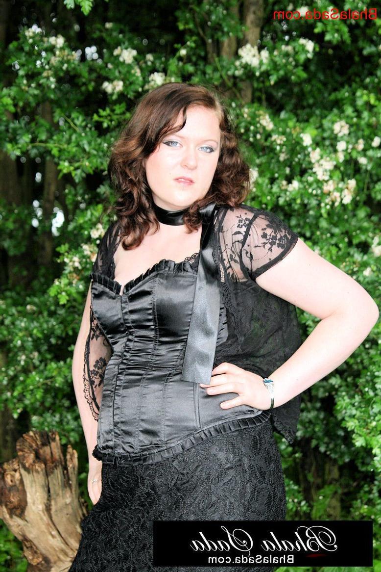 15P Chubby brunette MILF posing in an attractive satin and lace outfit in nature