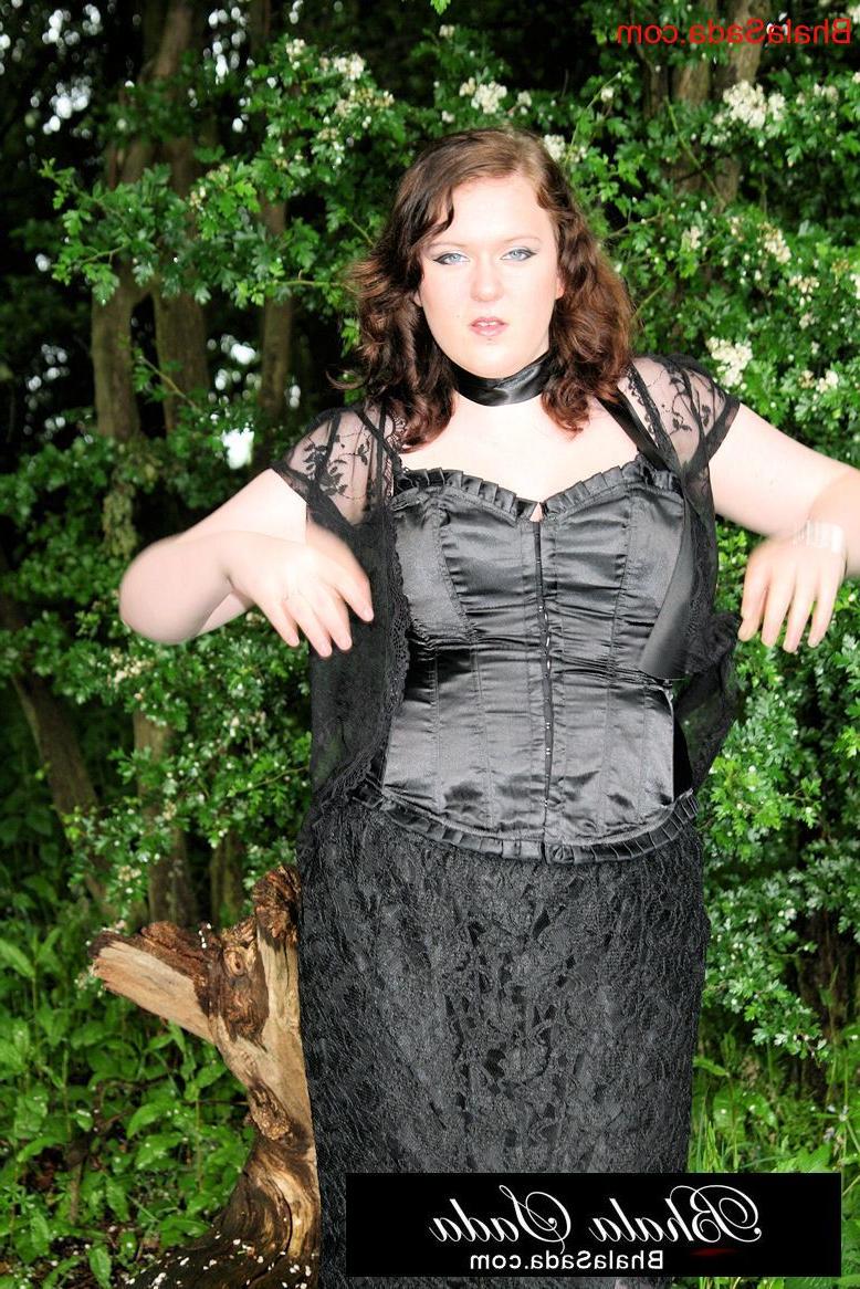 15P Chubby brunette MILF posing in an attractive satin and lace outfit in nature