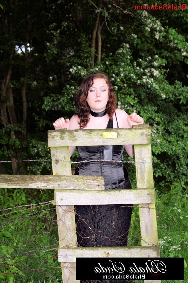 15P Chubby brunette MILF posing in an attractive satin and lace outfit in nature