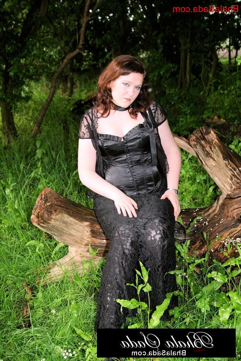 15P Chubby brunette MILF posing in an attractive satin and lace outfit in nature
