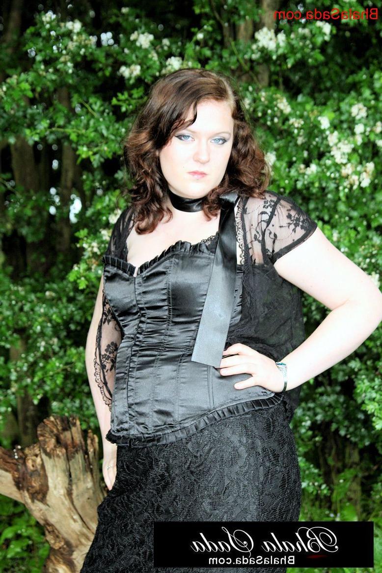 15P Chubby brunette MILF posing in an attractive satin and lace outfit in nature