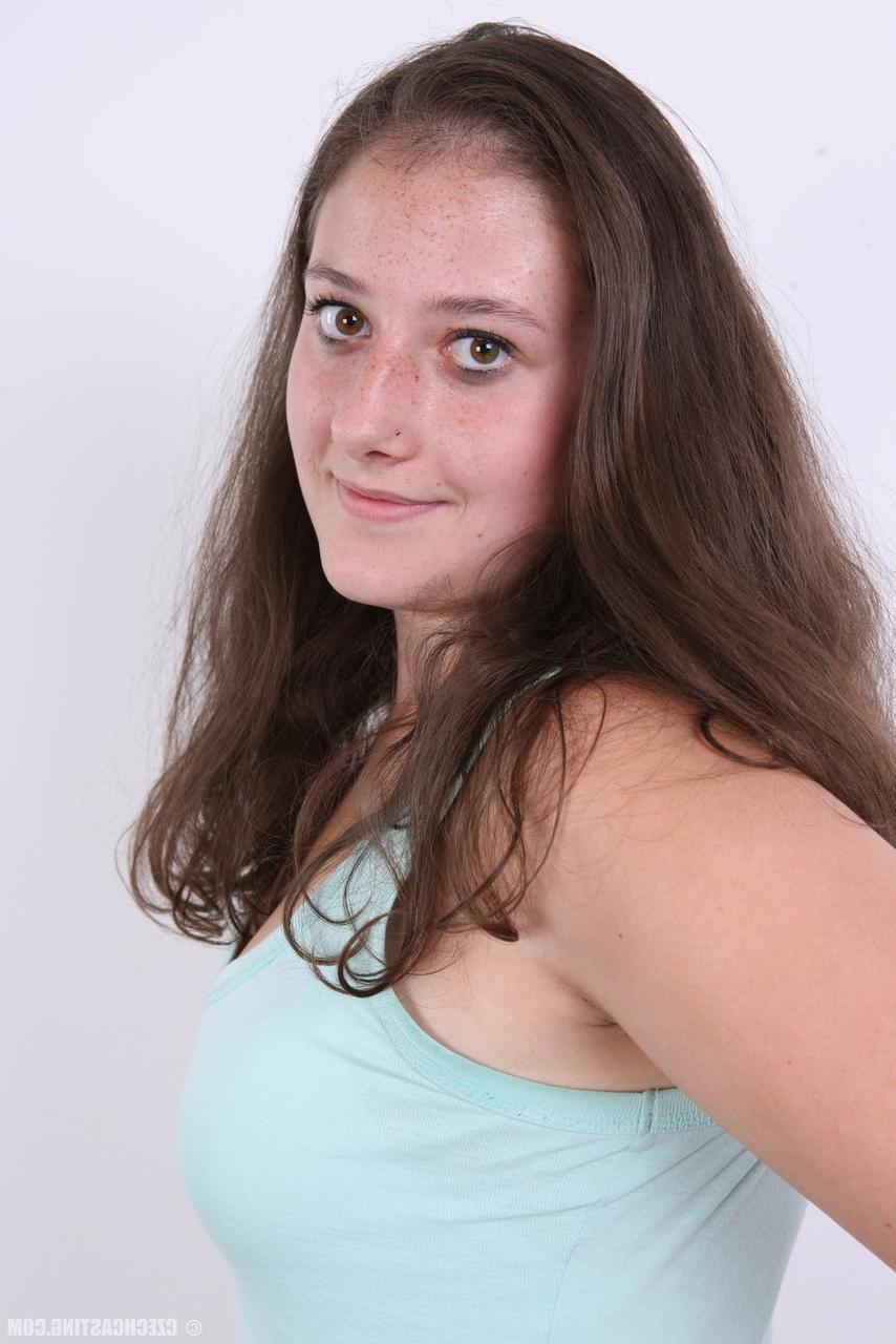 20P Plump girl Klara stands fully clothed before making her totally nude debut