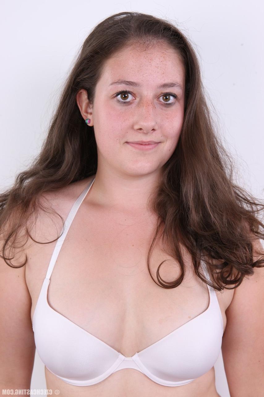 20P Plump girl Klara stands fully clothed before making her totally nude debut