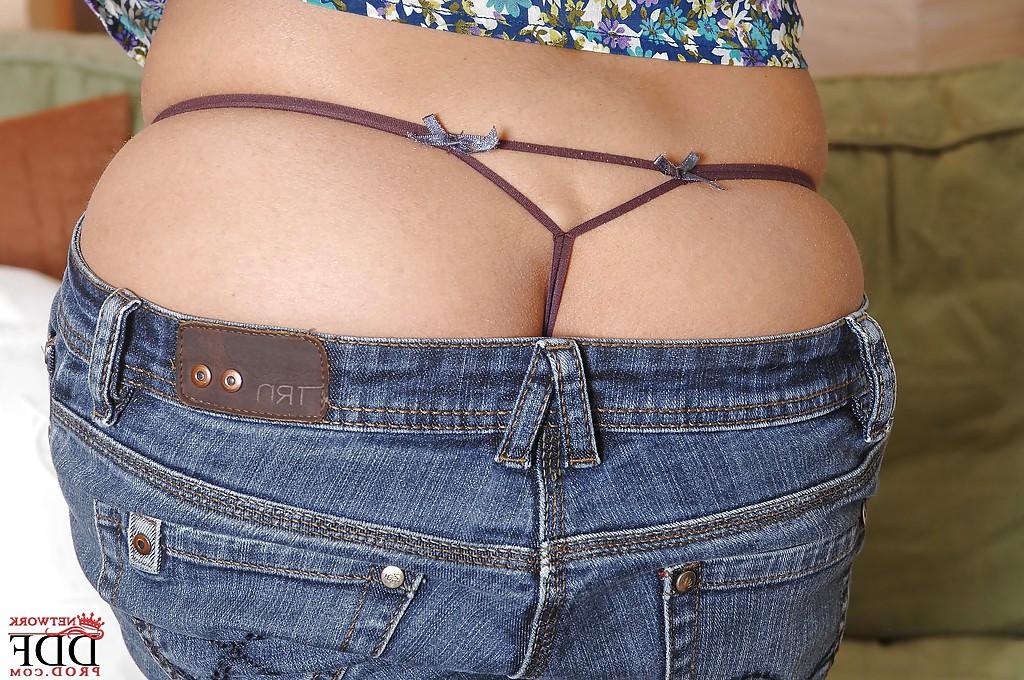 16P Curly-haired glamorous model Eve Angel takes off her tight jeans