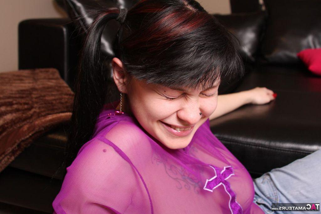 20P Amateur model Susy Rocks strikes tempting poses in a see-thru shirt and jeans