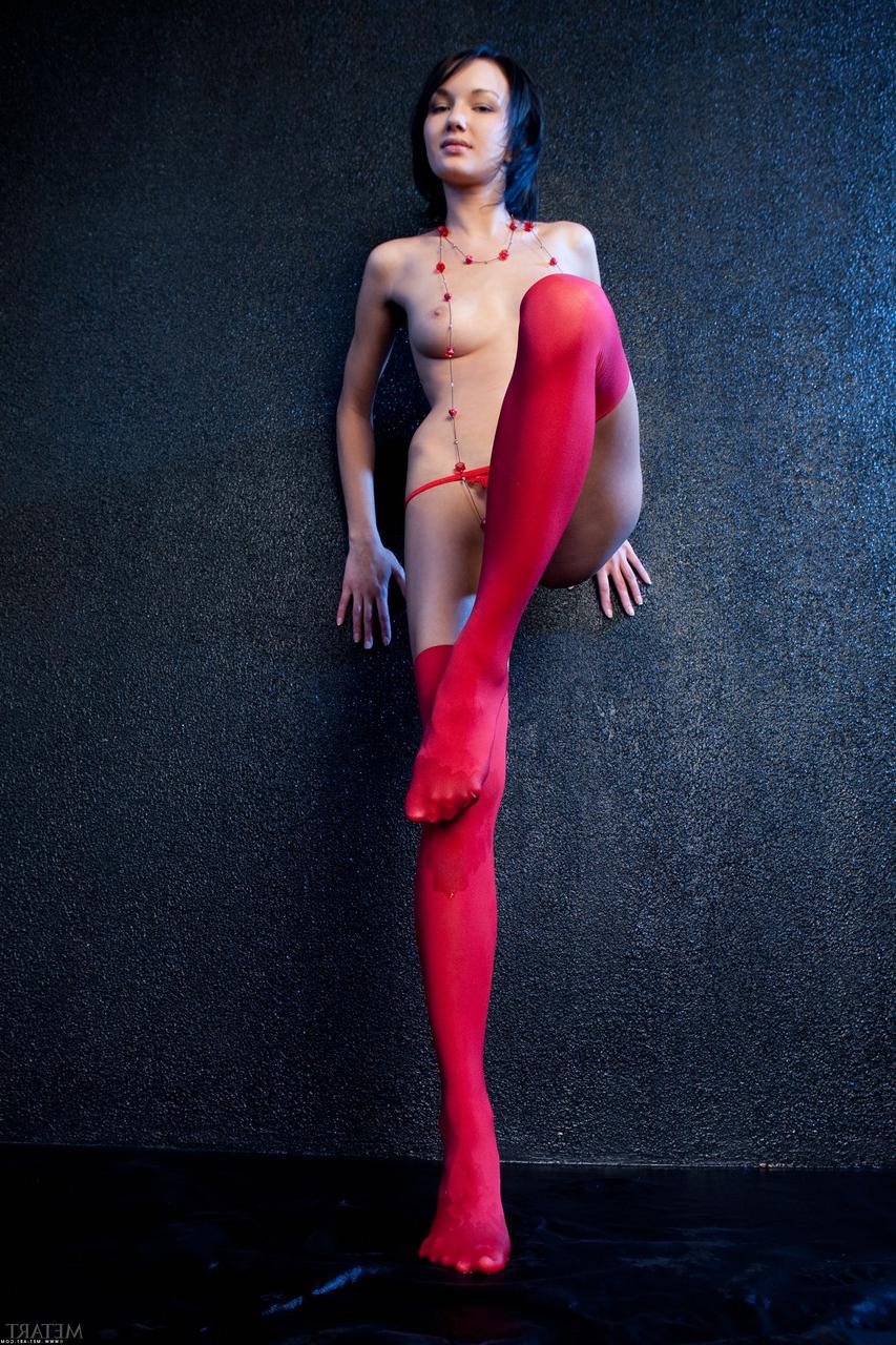 20P Babe Loreen A poses seductively in her red stockings & shows her hairy twat