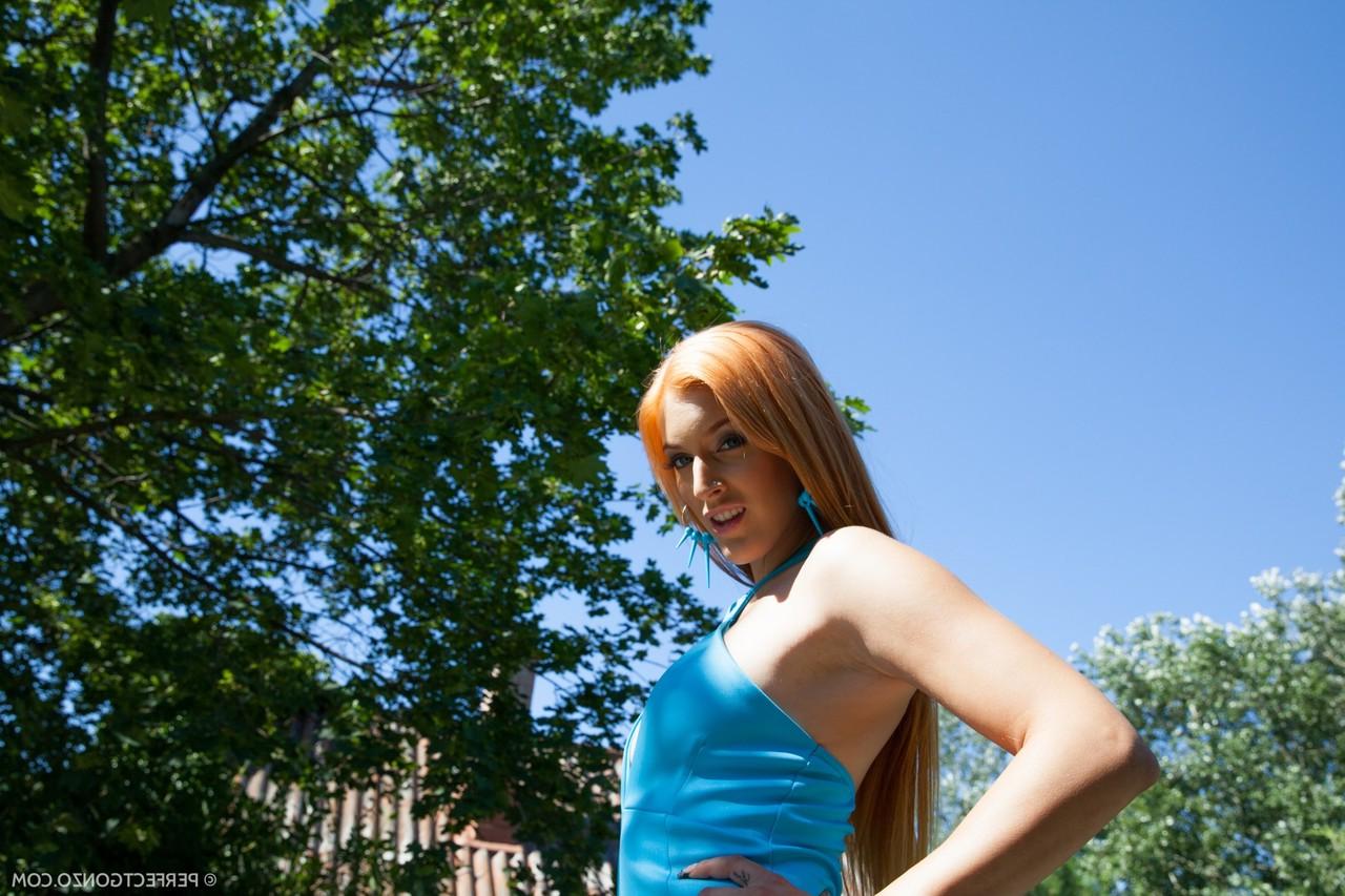 16P Natural ginger Mira Sunset pulls down a thong with her dress hitched up