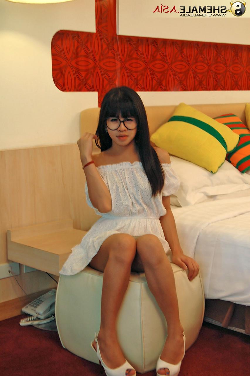 20P Dark haired tranny in glasses Mydeer flaunts her small tits and tasty dick