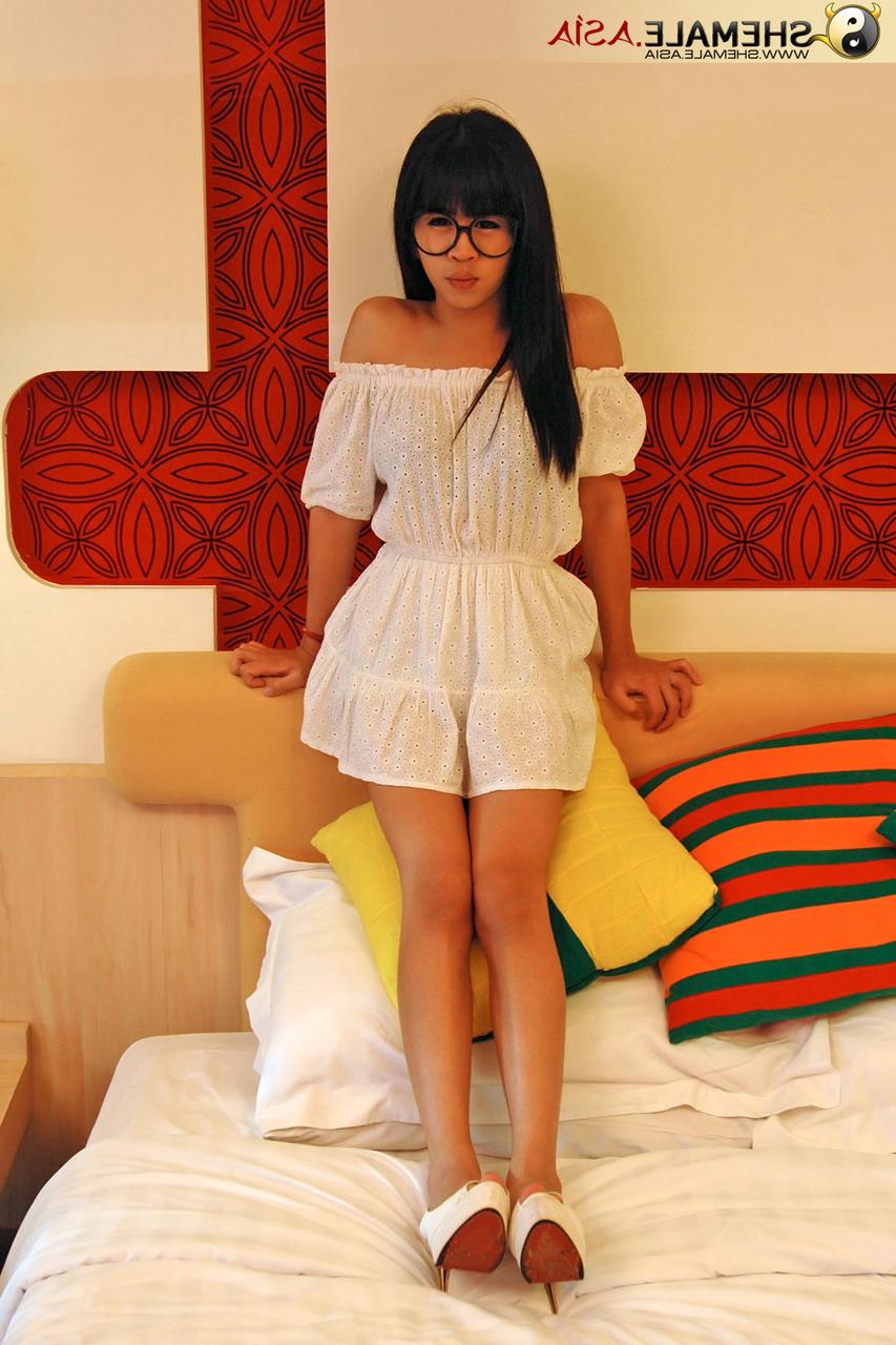 20P Dark haired tranny in glasses Mydeer flaunts her small tits and tasty dick