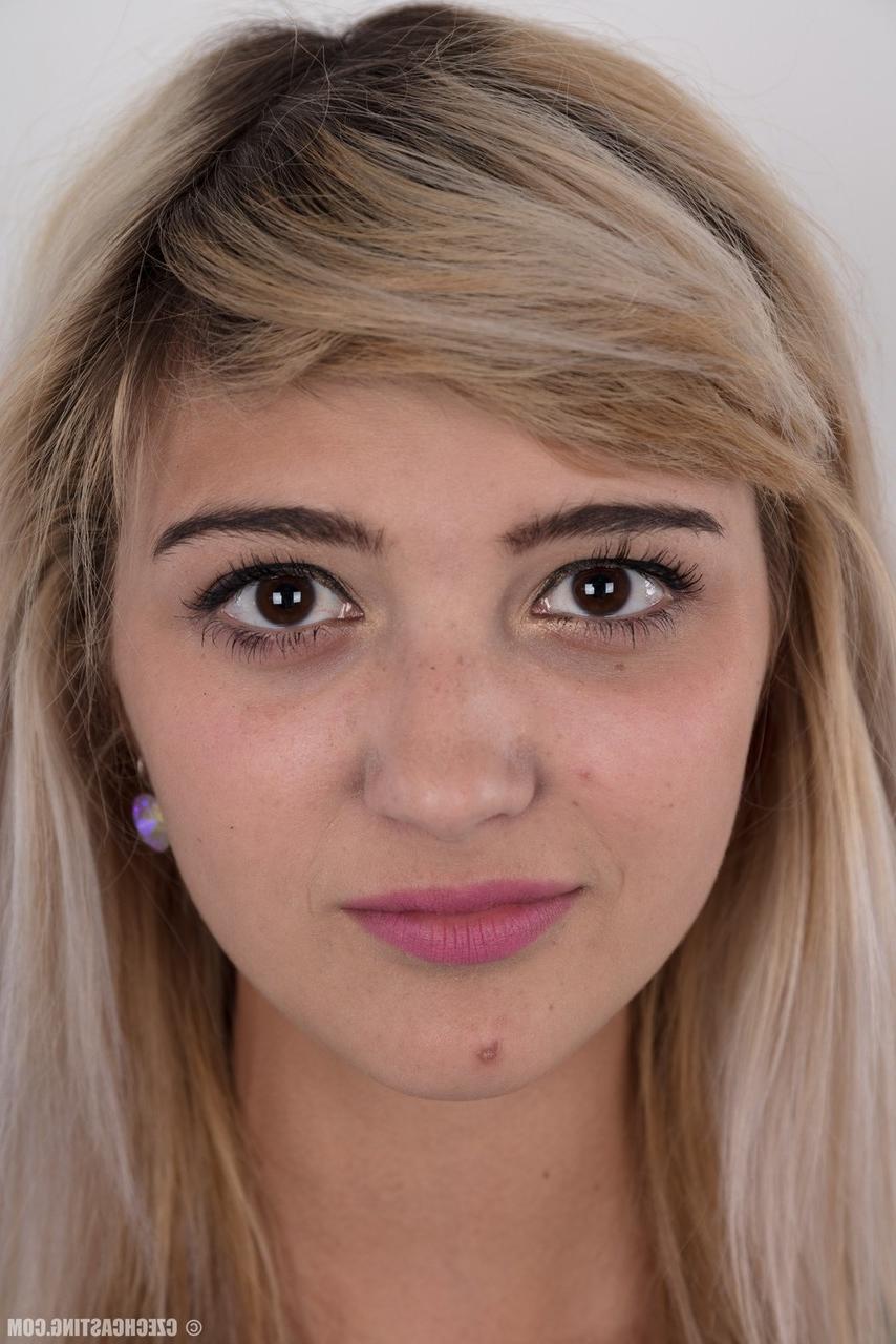 20P Teen Karolina hopes to break into porn by peeling her short skirt to pose nude