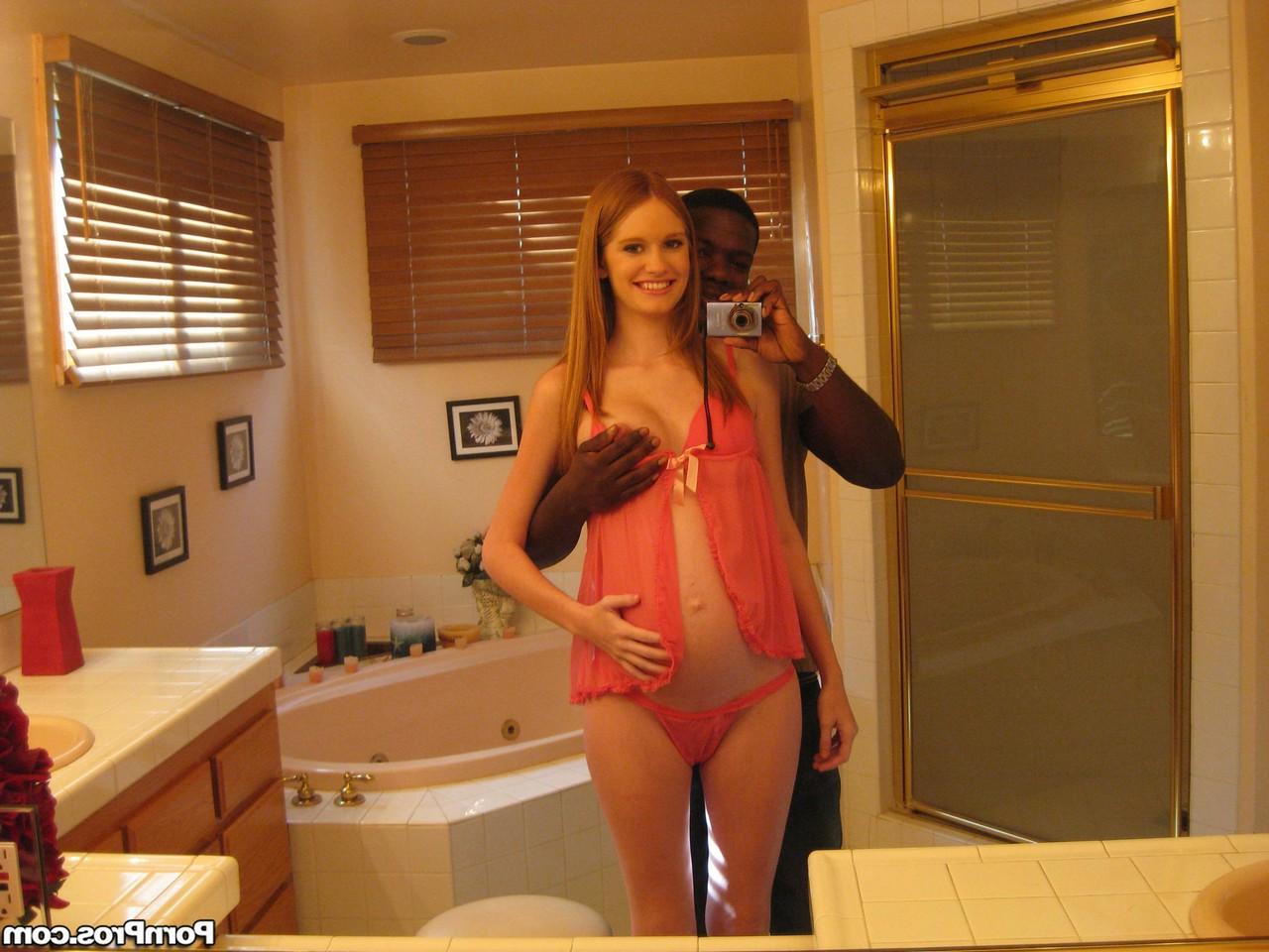 16P Pregnant redhead Layla Exx poses for the photoshoot with black guy