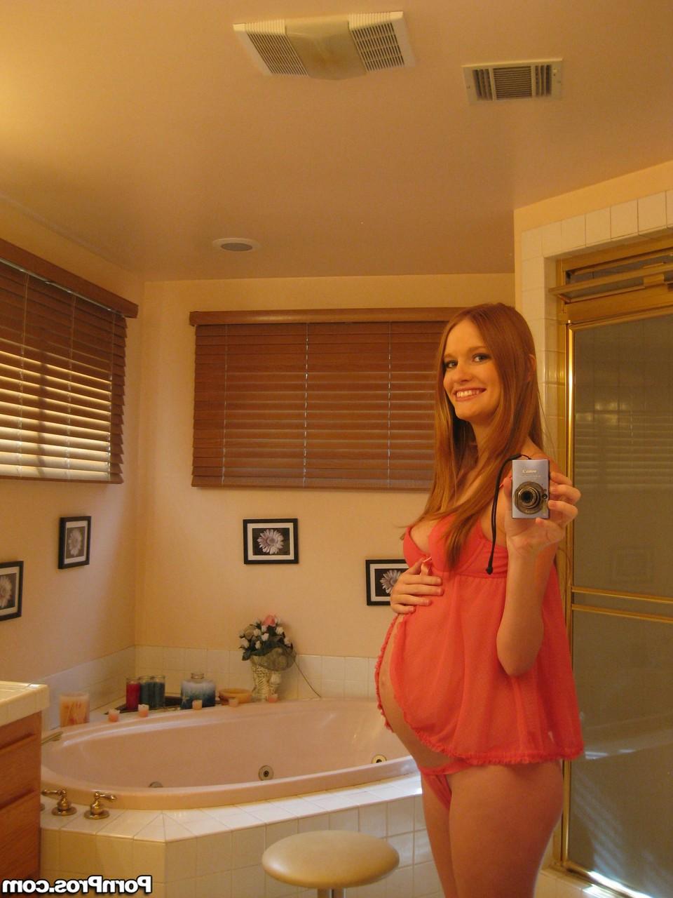 16P Pregnant redhead Layla Exx poses for the photoshoot with black guy