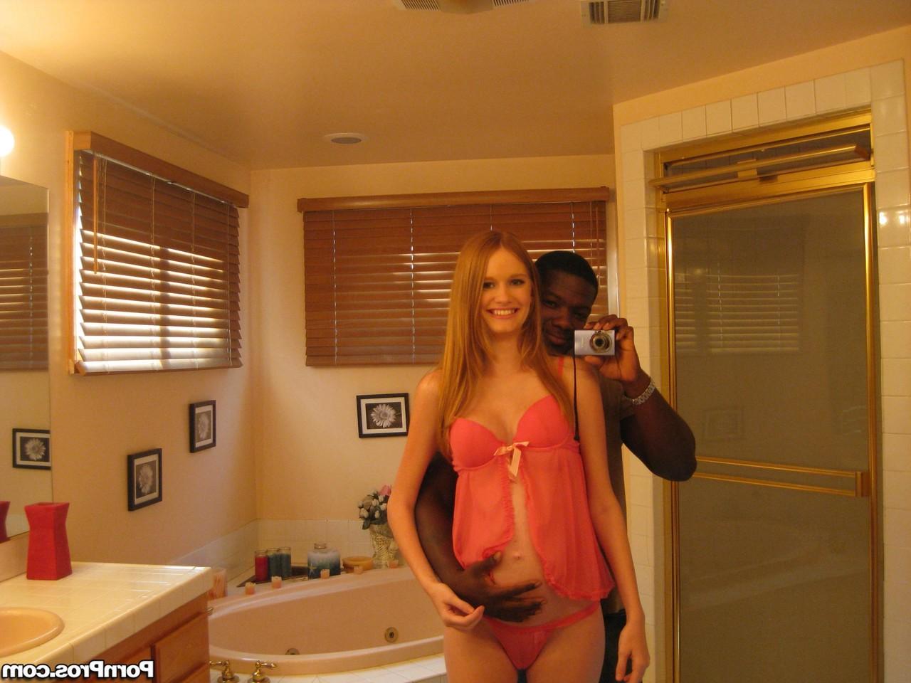 16P Pregnant redhead Layla Exx poses for the photoshoot with black guy