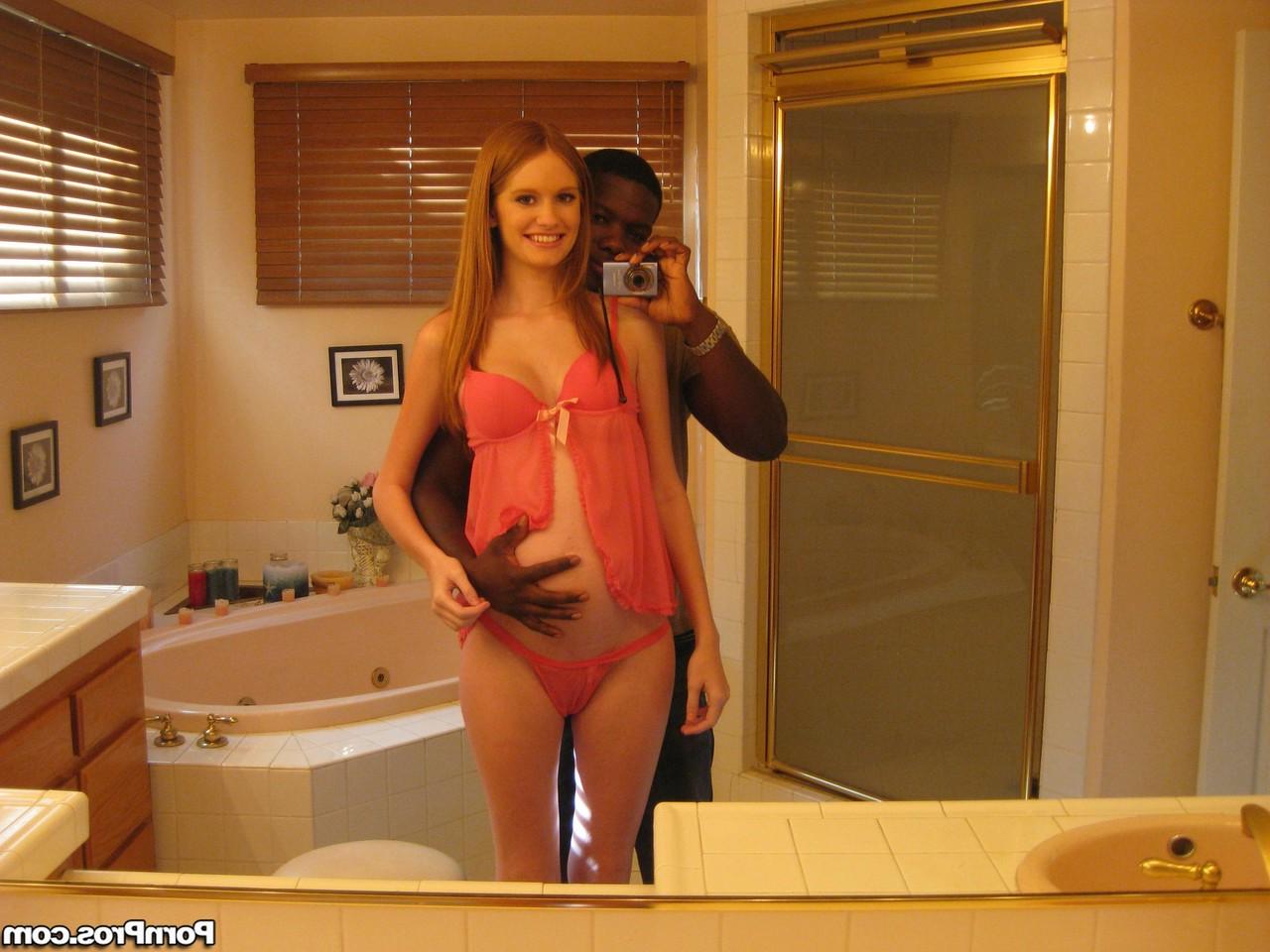 16P Pregnant redhead Layla Exx poses for the photoshoot with black guy
