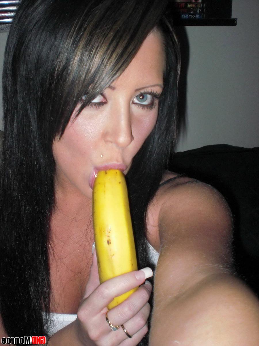 12P Brunette amateur sucks on a banana before showing her tits and ass