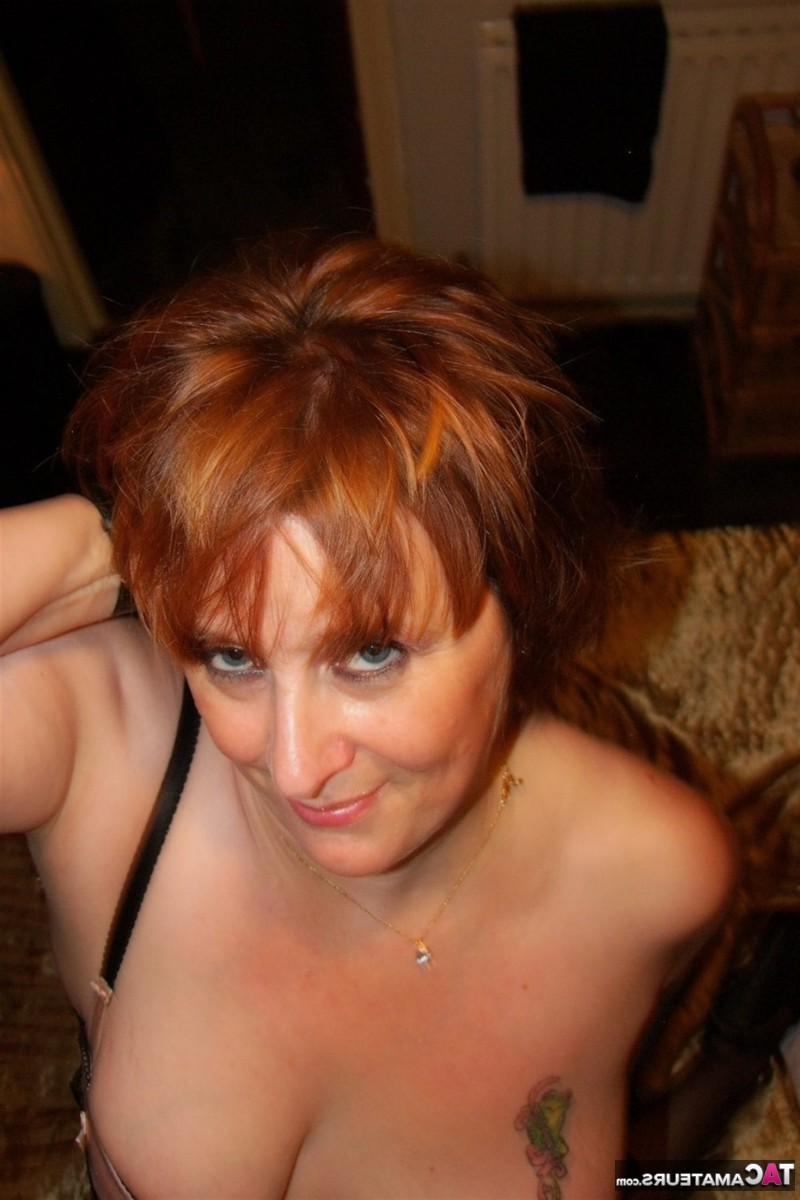16P Mature redhead Roxy Maidstone masturbates on a bed in cosplay attire