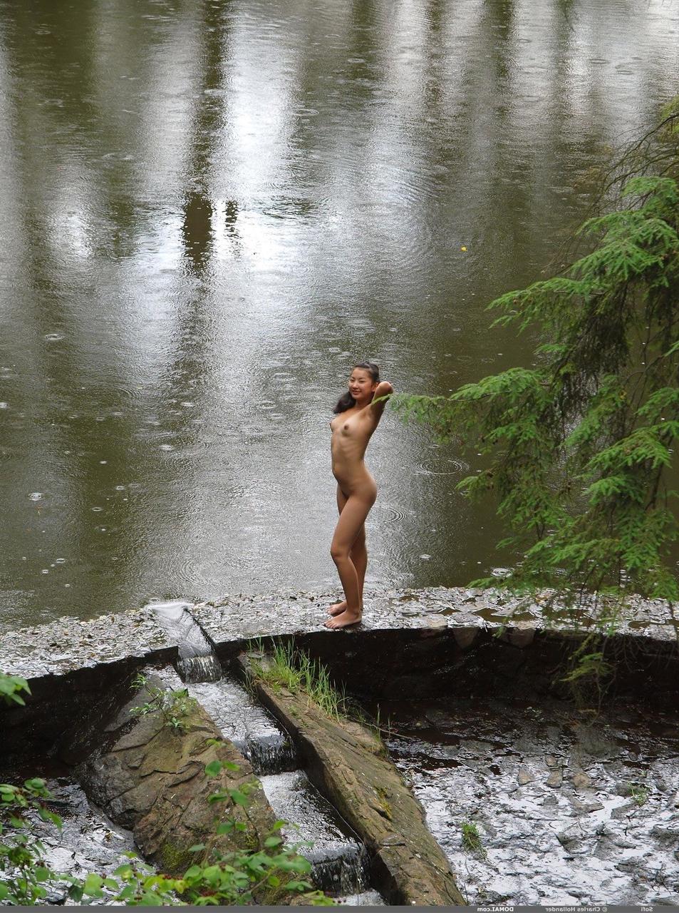 20P Exotic Asian babe Sofi playing buck naked in a hot romp at a public park