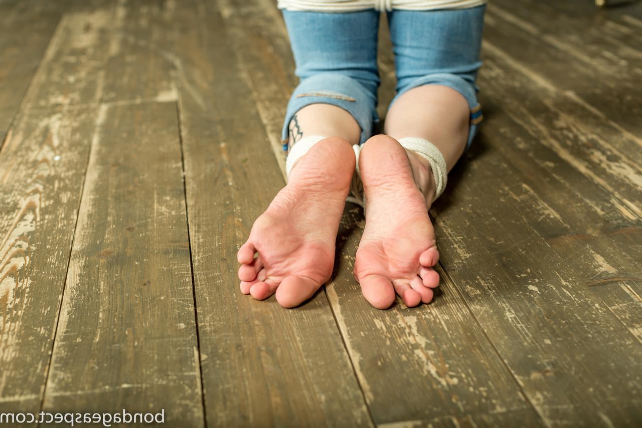 12P Barefooted white girl Vika is left gagged and tied up with rope
