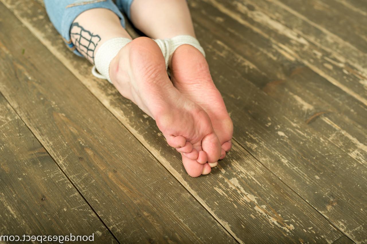 12P Barefooted white girl Vika is left gagged and tied up with rope