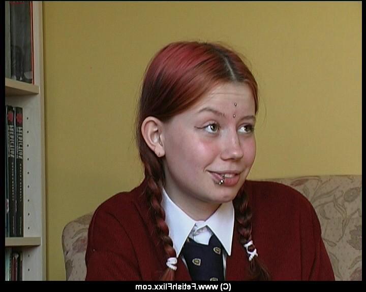 12P Redheaded student has her bare bottom turned pink during a caning session