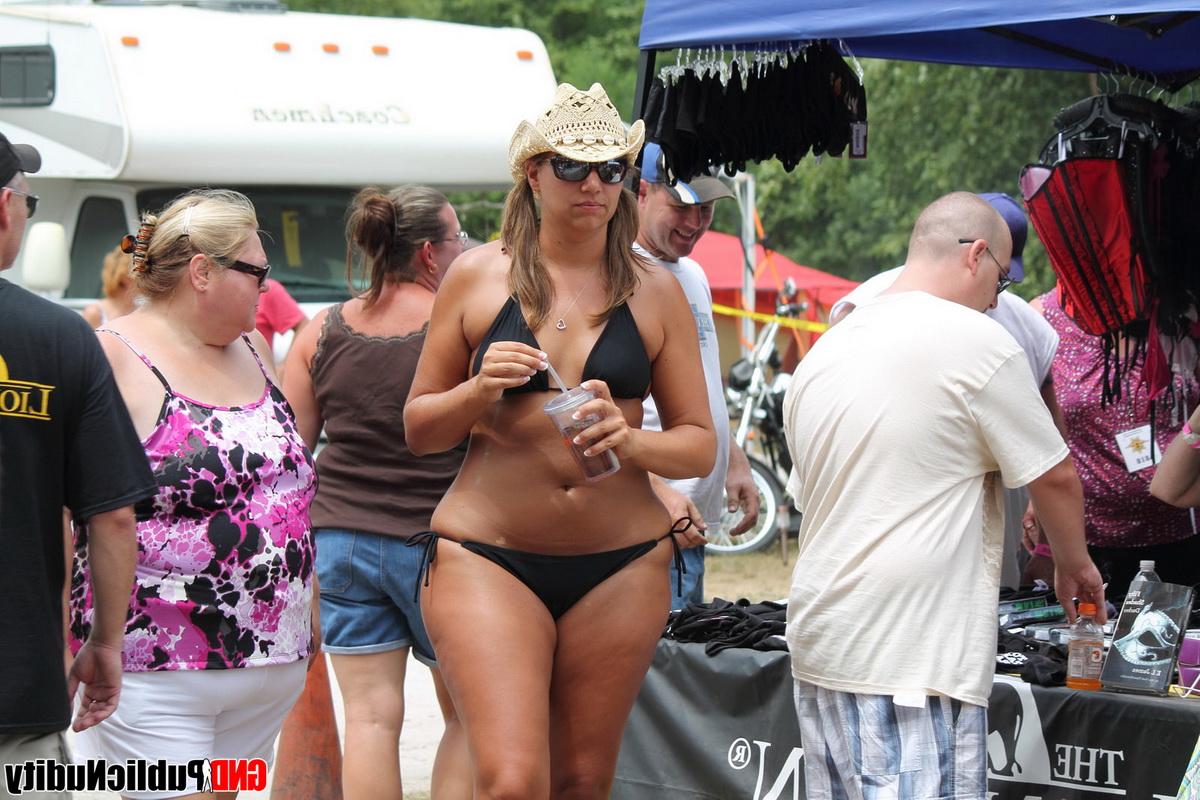 12P Caucasian strippers pose in the nude while attending an adult festival
