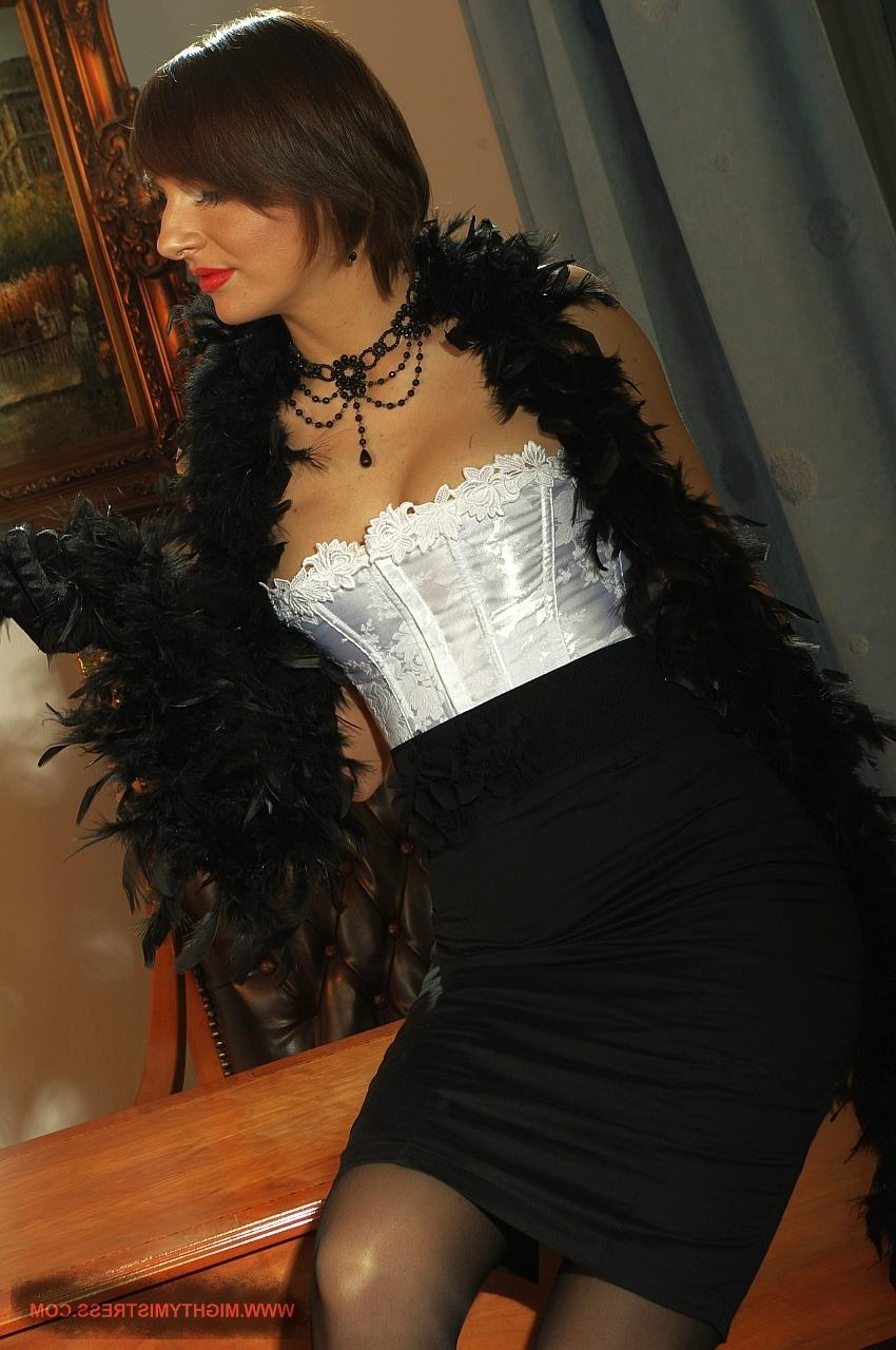 17P Chick in dark silk and feathers Nina Young is feeling horny at home