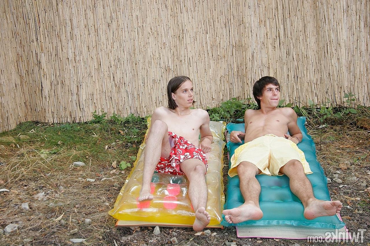 17P Skinny twinks strip their shorts and engage in outdoor gay sex action