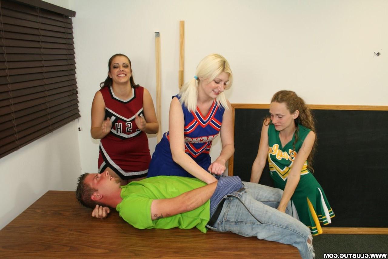 12P Cheerleaders push a boy down before jerking and sucking on his cock