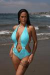 17P On the sunny beach with mind-blowing owner of bit tits and ass Carmella Bing