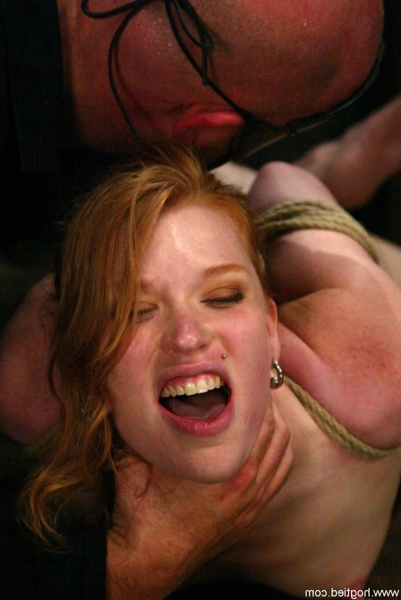 20P Sexy redhead Madison Young gets tied up in rope bondage while naked