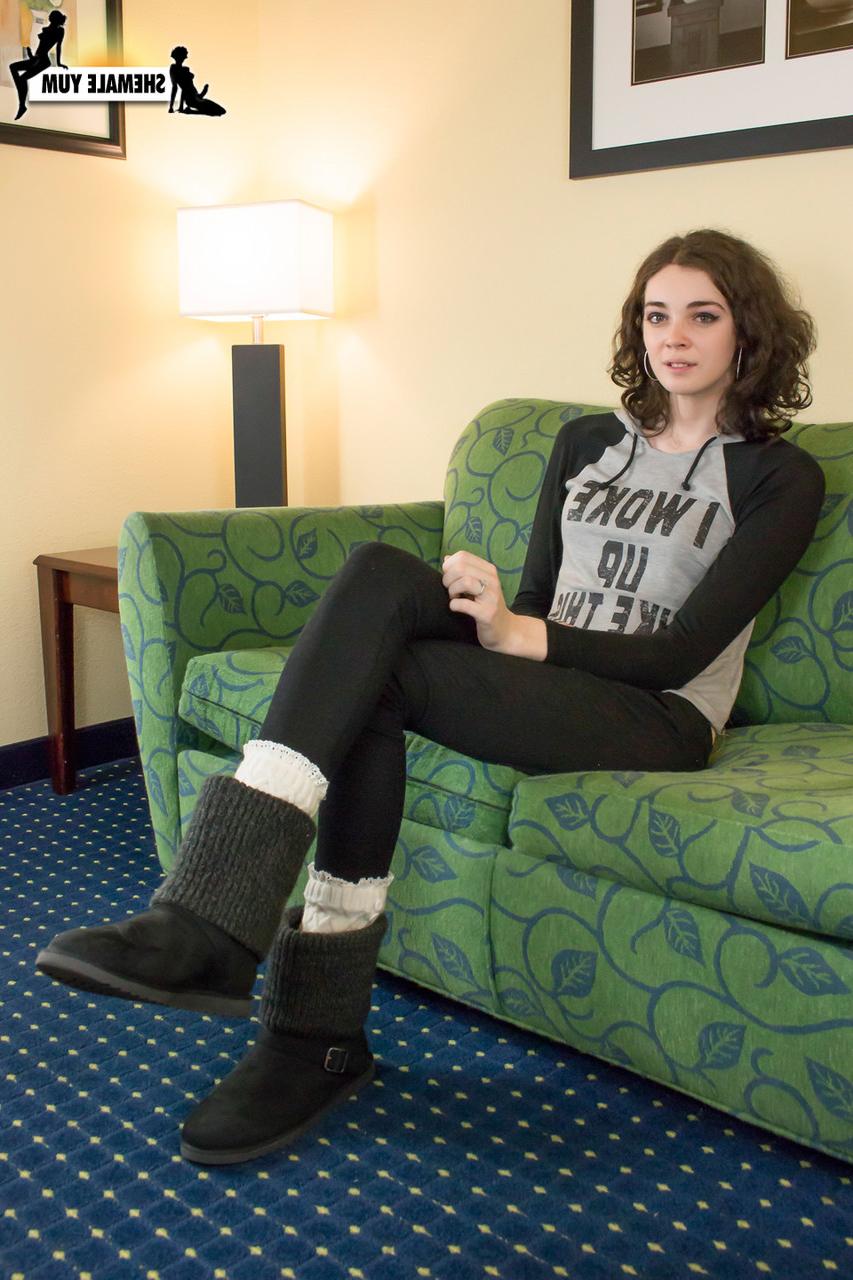 15P Dark-haired shemale Sasha Skyes displaying her sensitive feet, cock & booty